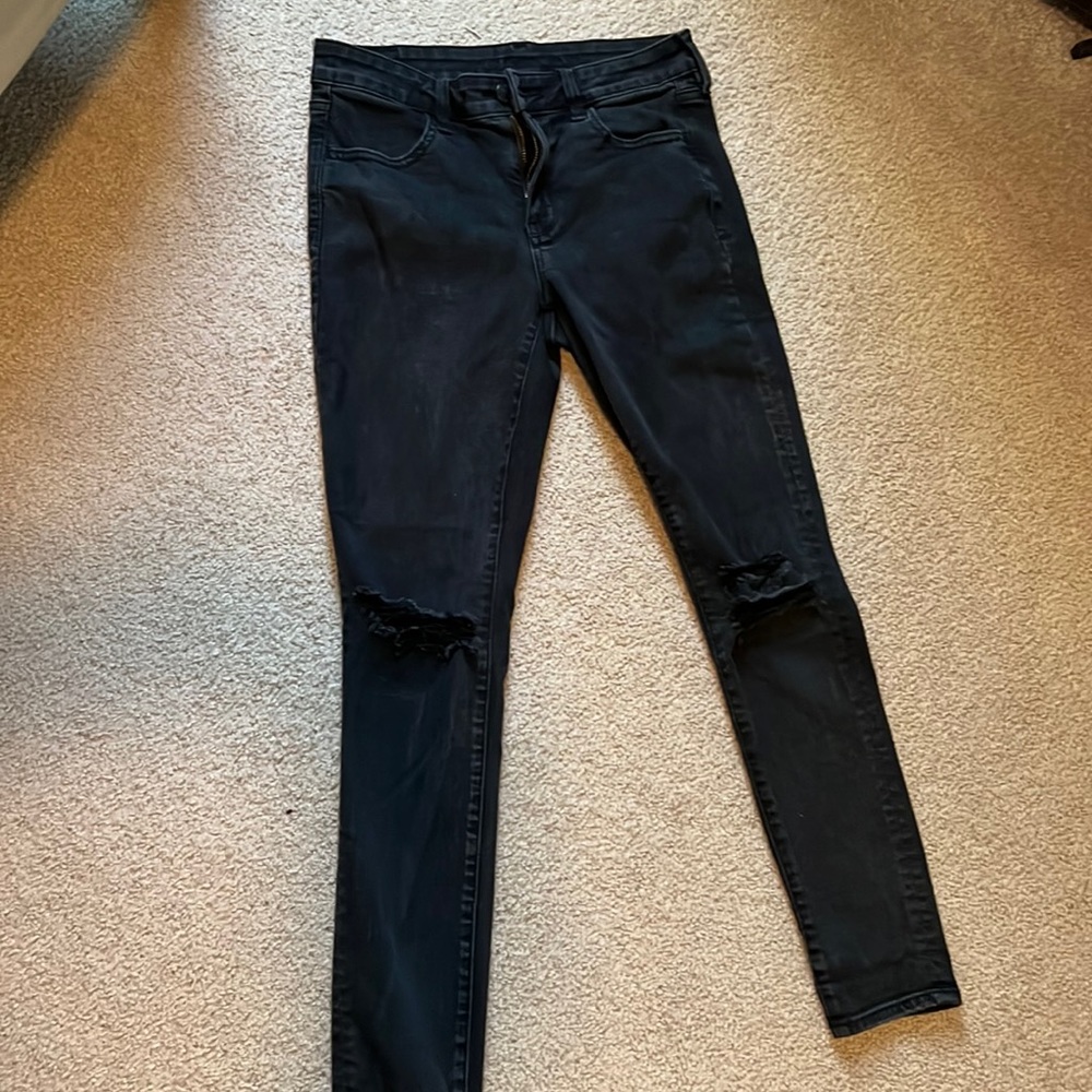 Black distressed skinny jeans